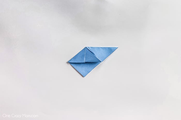 Paper folded on one side.