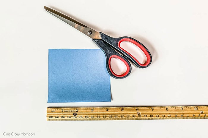 Paper cut into square.