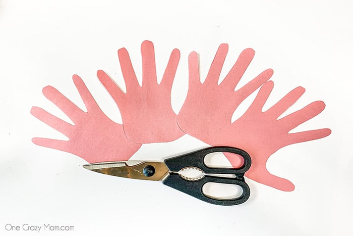 Hands being traced.