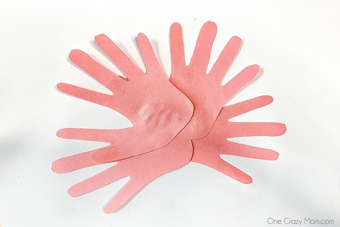 Hands glued together.