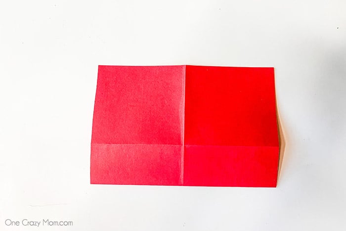 Botton corner folded on paper.