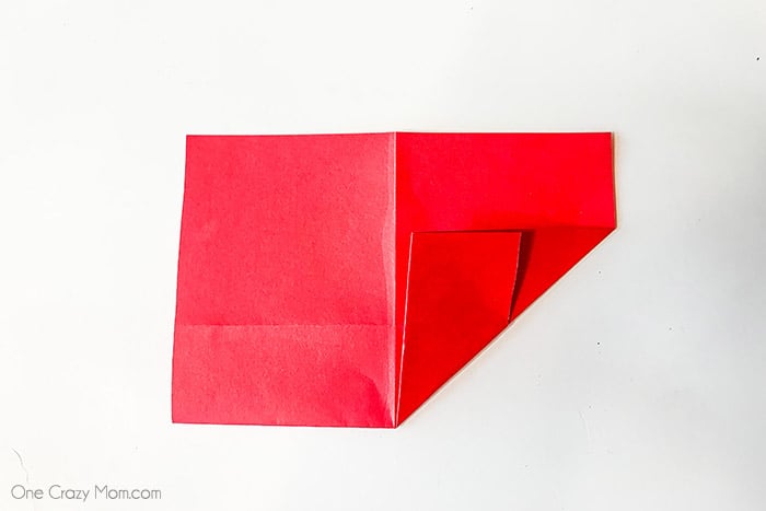 Corner folded up on right side.