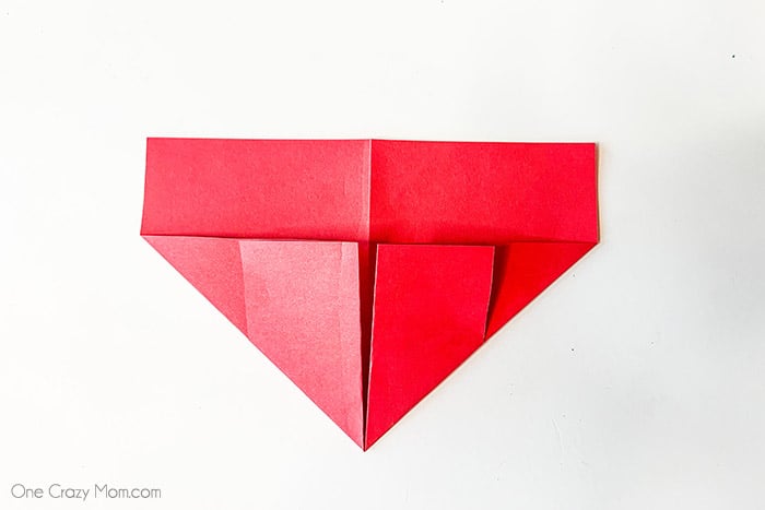 Corner folded on both corners.