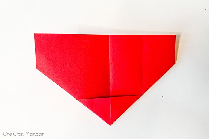 Triangle pocket folded at the center.