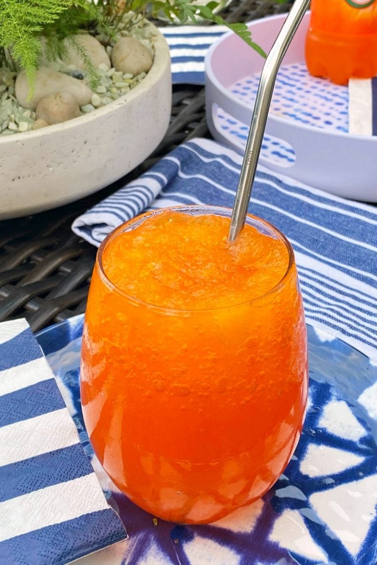 Slurpee in a cup with a straw.