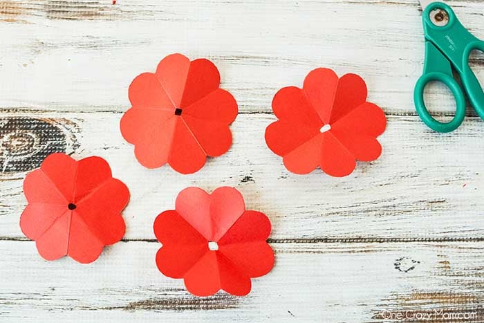 Paper cut into flower segments.