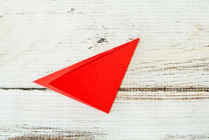 Paper folded into a triangle.