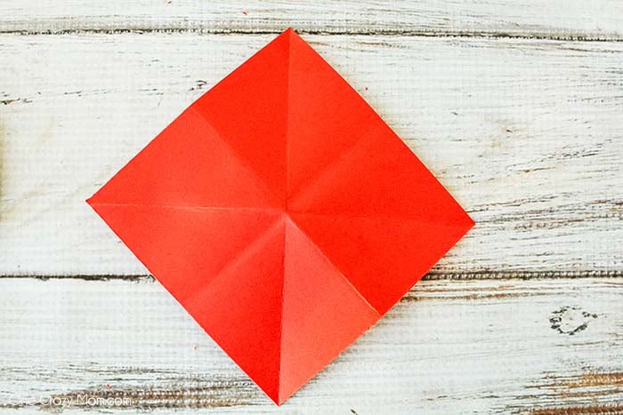Paper with 8 folded segments.