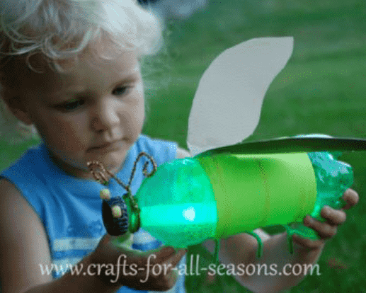 Lightning Bug craft in hands.