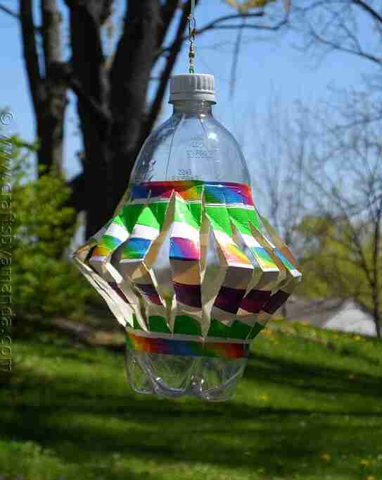 Hanging wind spinner in yard.