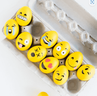 Emoji Eggs in carton.