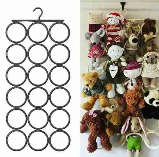 Scarf organizer with stuffed animals.