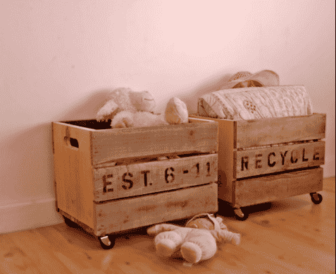 Wooden crates with stuffed animals.