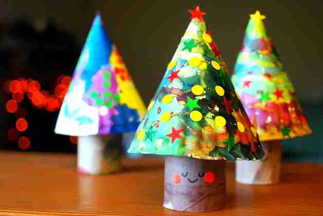 Christmas tree craft on table.