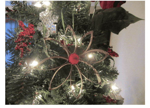 Flower ornament in tree.