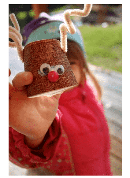 Reindeer Ornament in hand.