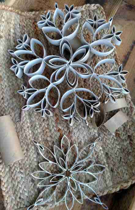 Snowflakes made from toilet paper rolls.