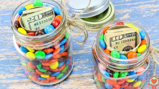 Jars of candy with hidden money in the middle.