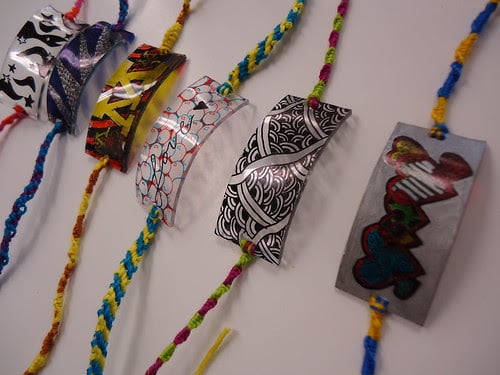 Bracelets with different shrinky dinks on them.