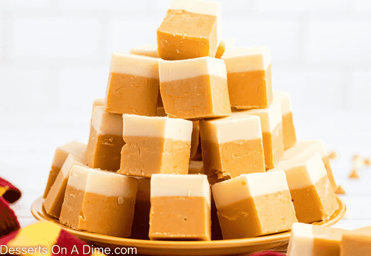Squares of butterbeer fudge on a platter.