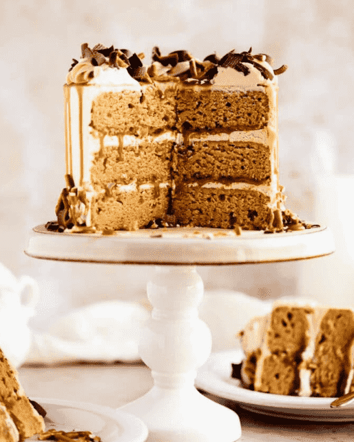 Butterscotch cake on a pedestal.