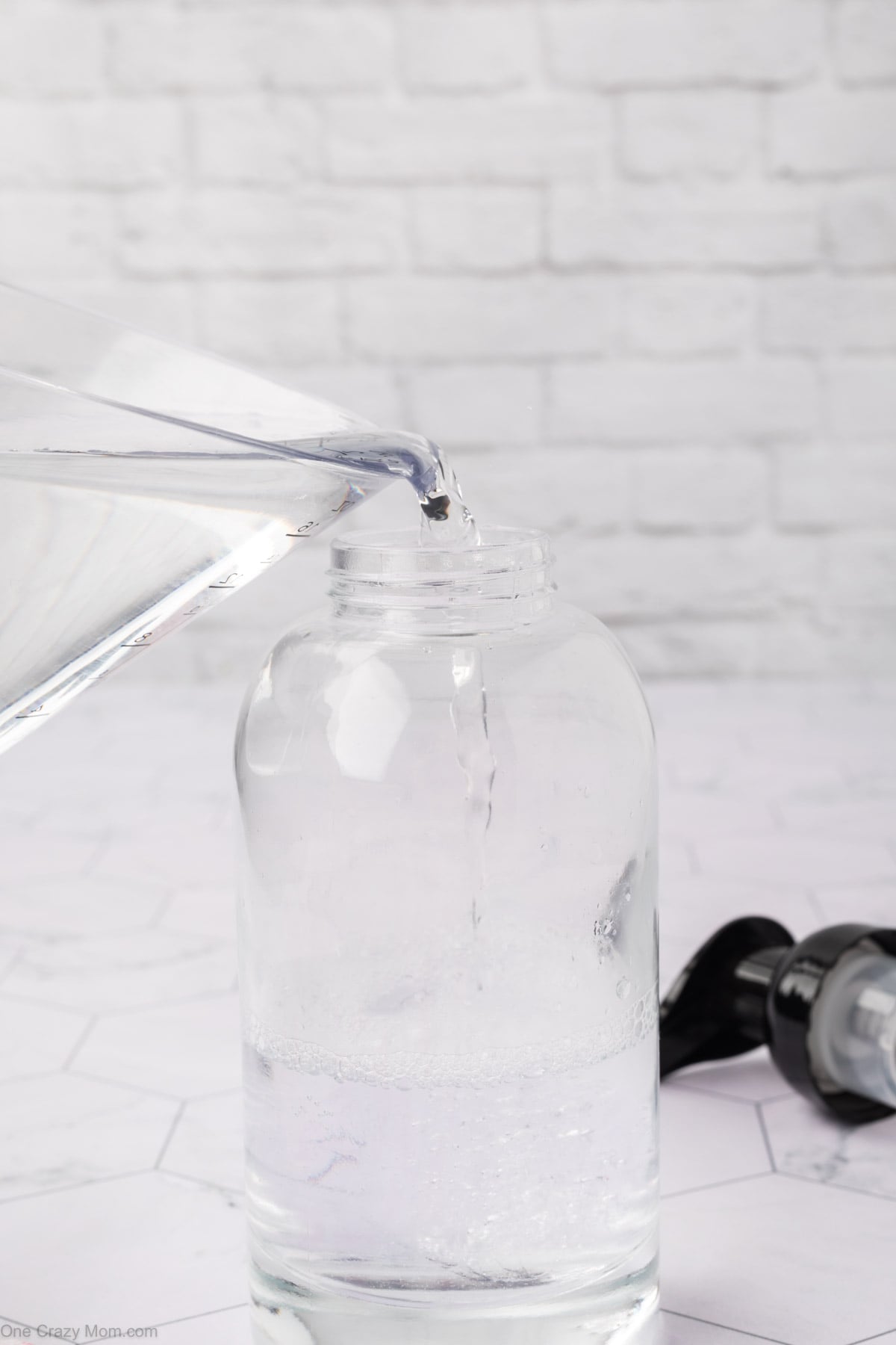 Water added to bottle with soap.