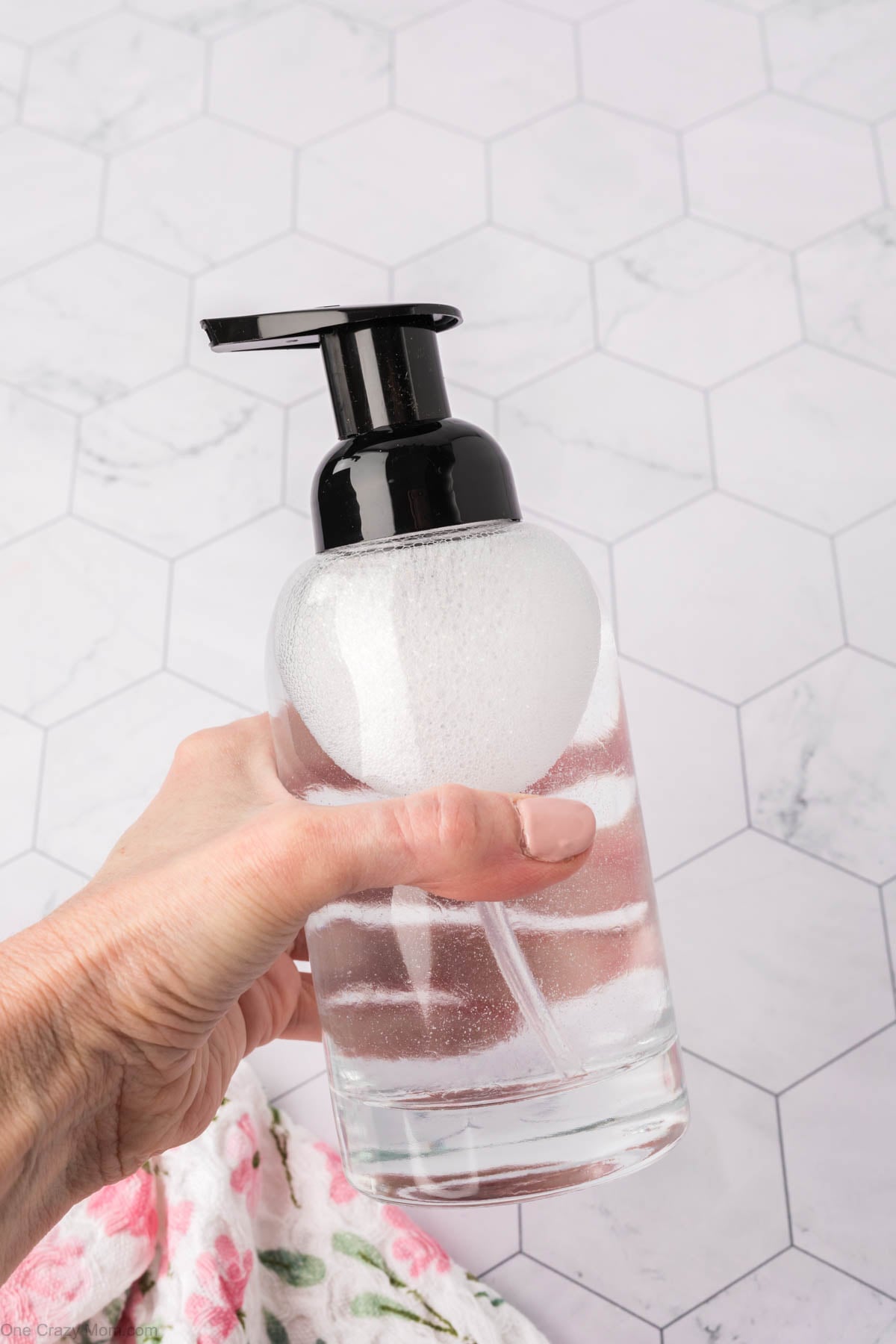 Soap dispenser with lid.
