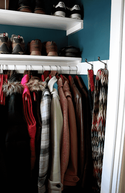 Coats hanging in closet.