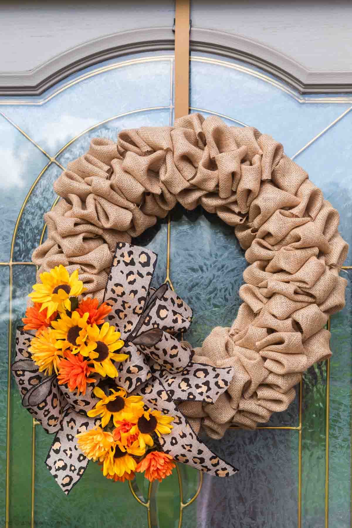 Burlap Wreath hanging on door.