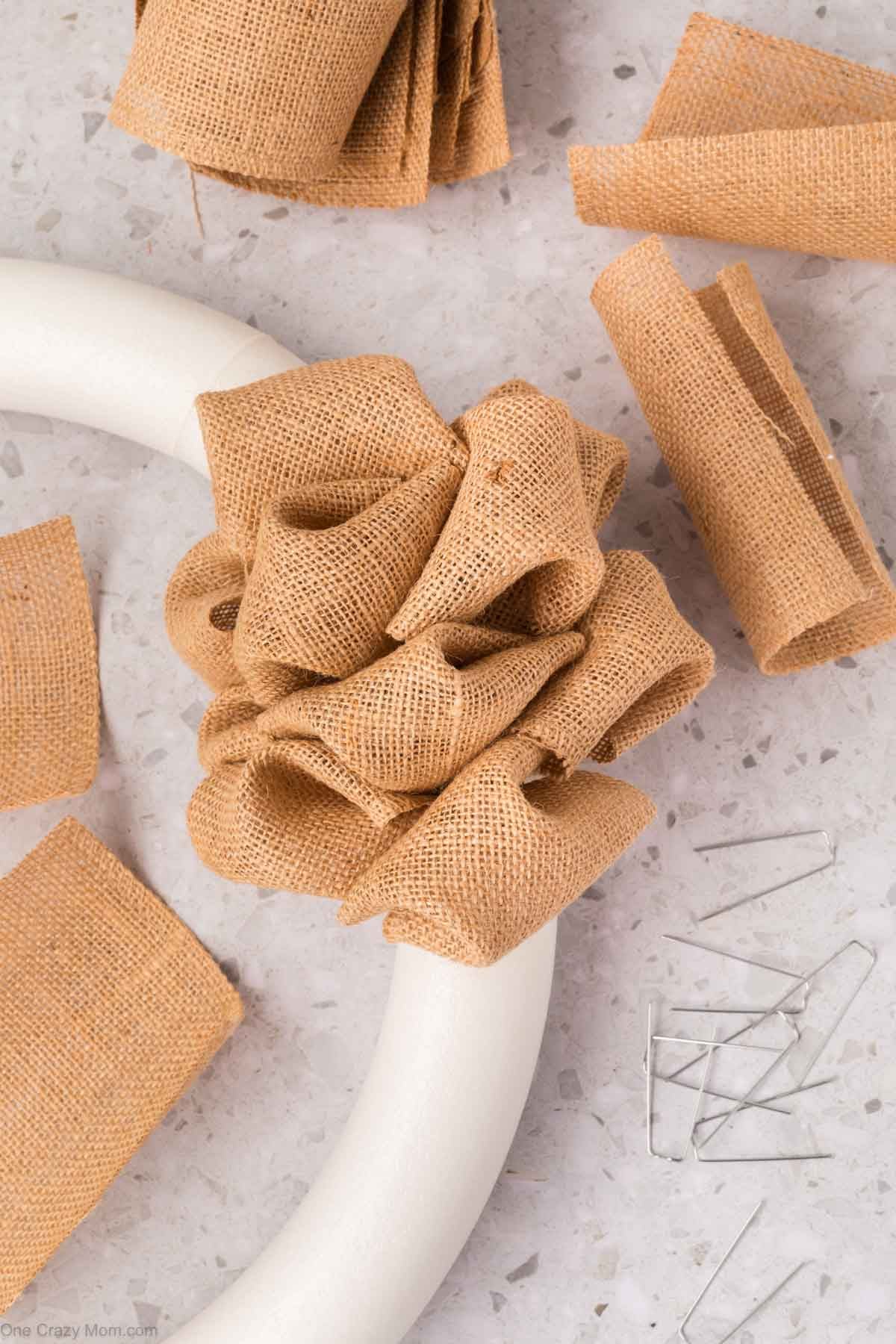 Burlap inserted into the wreath form.