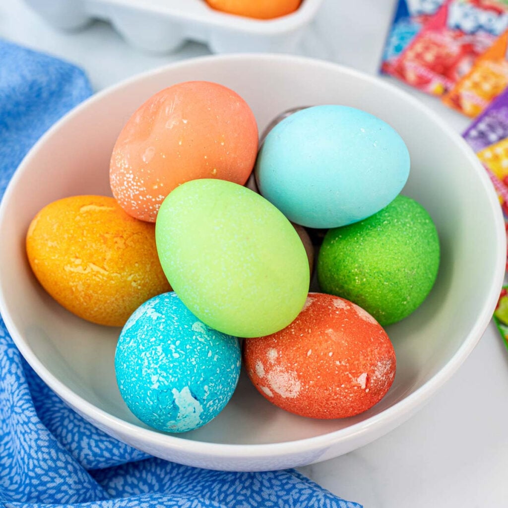 Kool Aid eggs in a bowl.