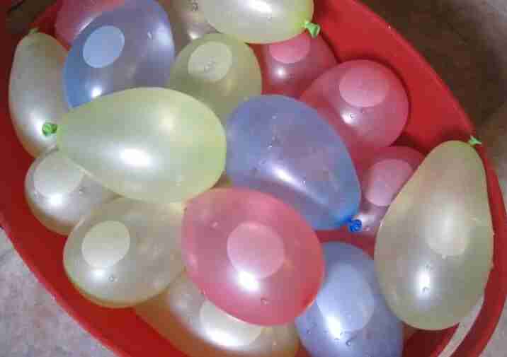 Water balloons in a bucket.