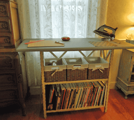 Ironing board on shelving unit.