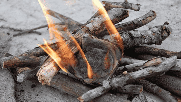 Egg cartons and lint used to start fire.