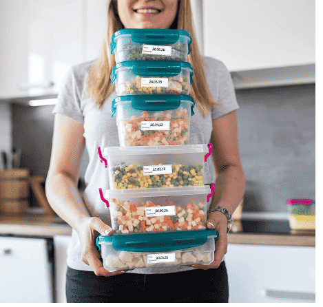 Woman holding containers.