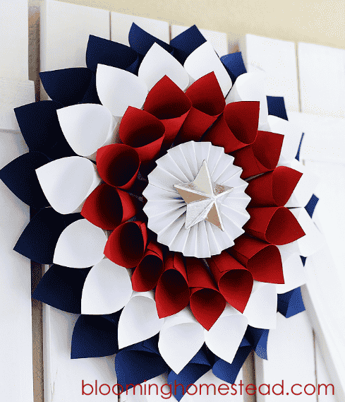 Cardstock wreath in red, white and blue on door.