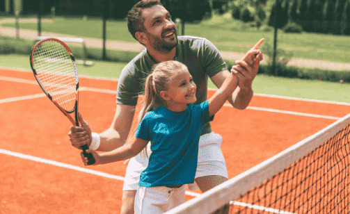 People playing tennis.