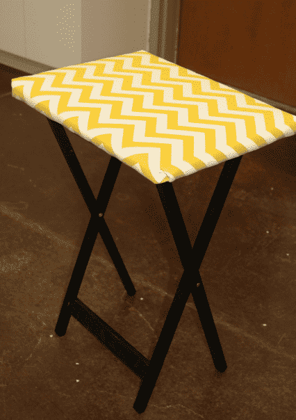 TV Tray with ironing board top.