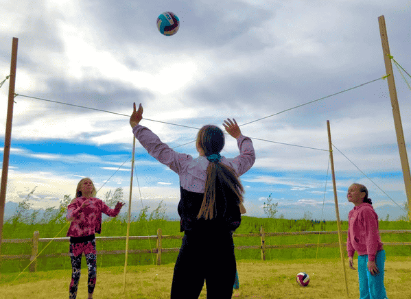 Volley ball four square with kids.