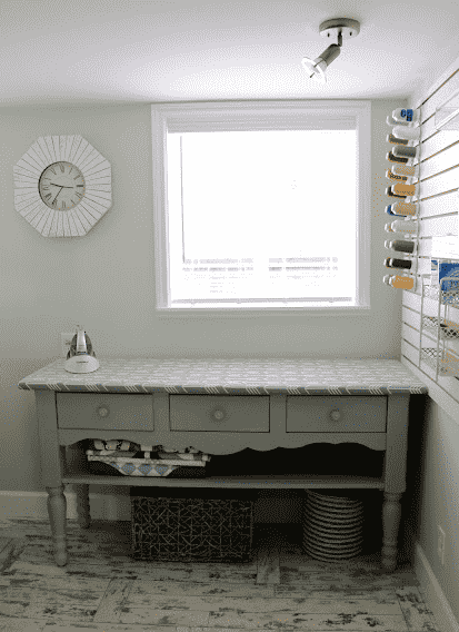 Side table with ironing board.