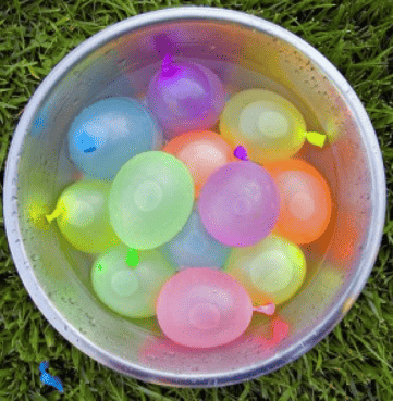 Water balloons in bucket.