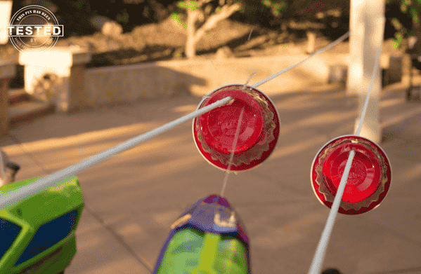 Squirt gun races with string.