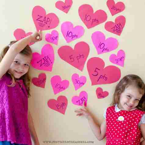 Hearts on the wall with children.