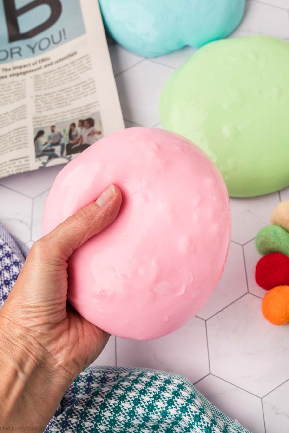 Silly Putty in someone's hand.