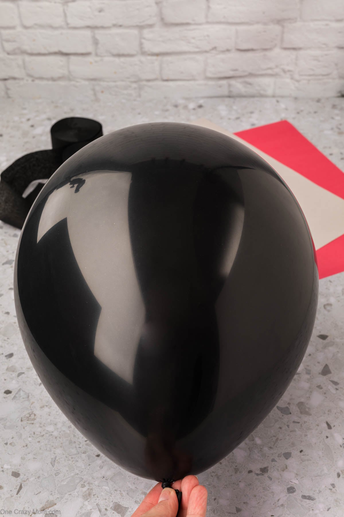 Black balloon blown up.