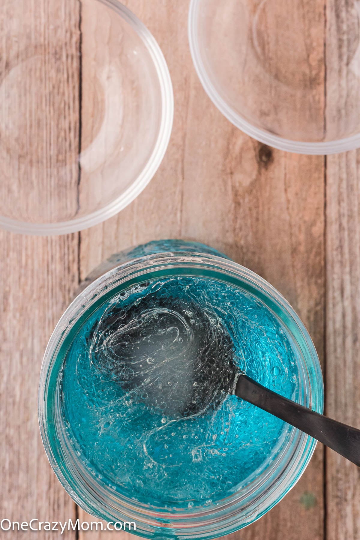 Bubbles mixed together in measuring cup.