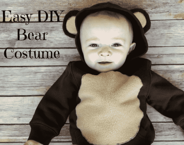 Baby in a bear costume.