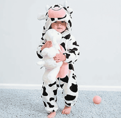 Child in cow costume.