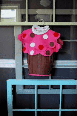 Cupcake costume hanging up.