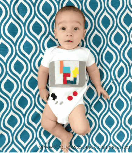 Baby in a game boy costume.